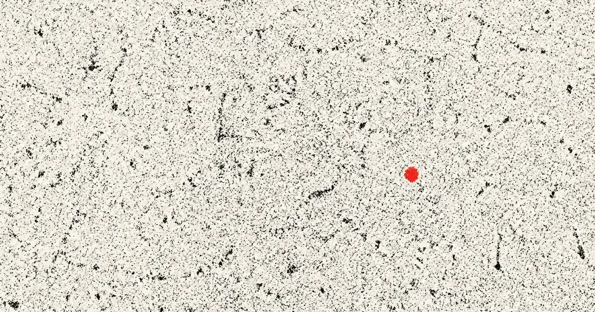 Close print of photocopy speckle on off-white stock