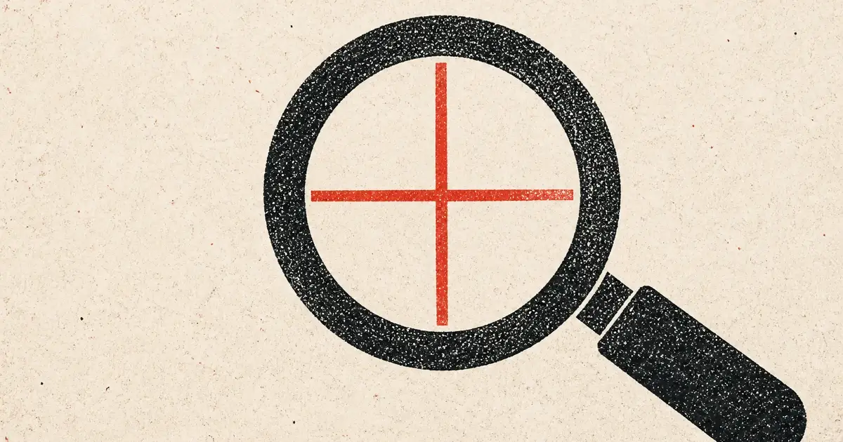Loupe as a black stamp circling a red registration mark