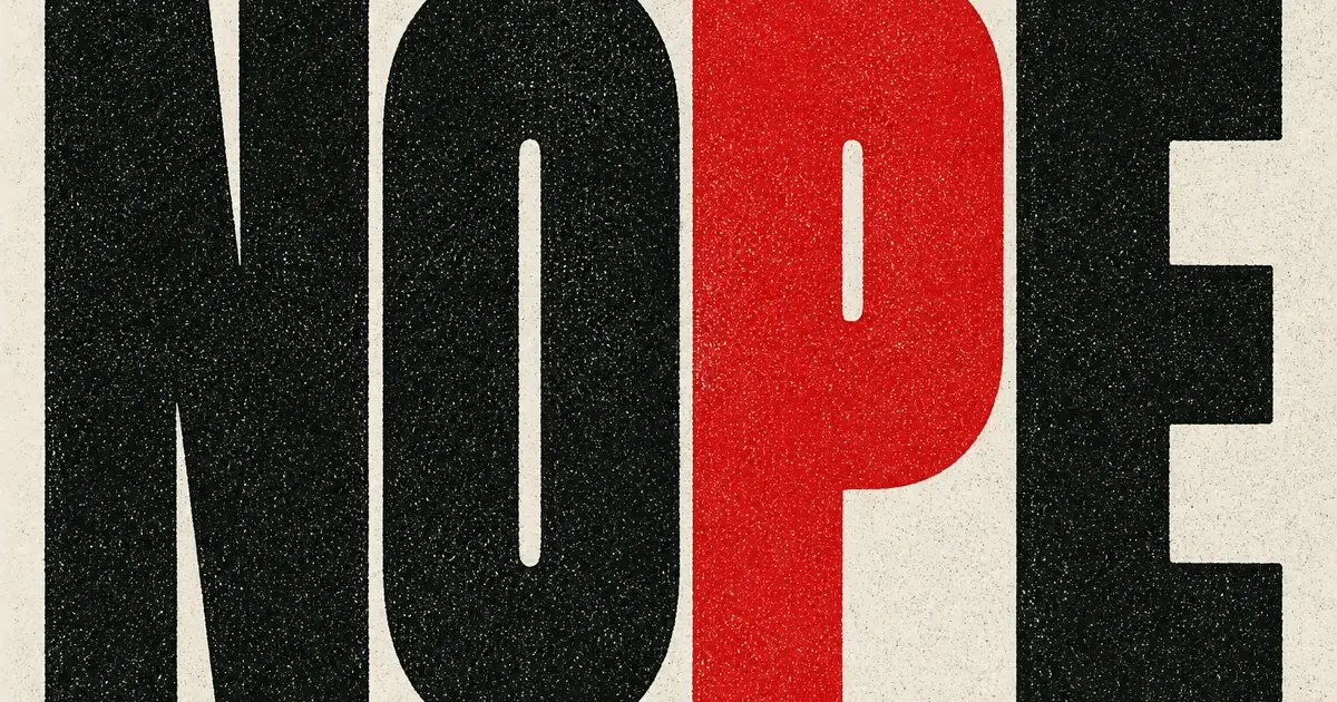 Cut stencil letters as black masses on grainy paper